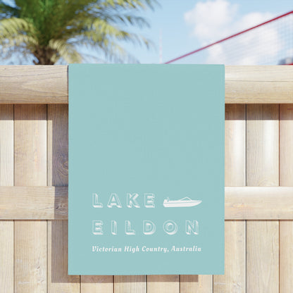 Lake Eildon Ski Boat Beach Towel, Pale Peach on Aqua Blue